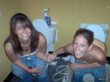 bathroom for 2 girls peeing next to each other