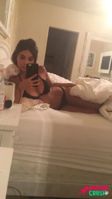 exposed hot busty Iranian MILF actor Mikaela bed selfie