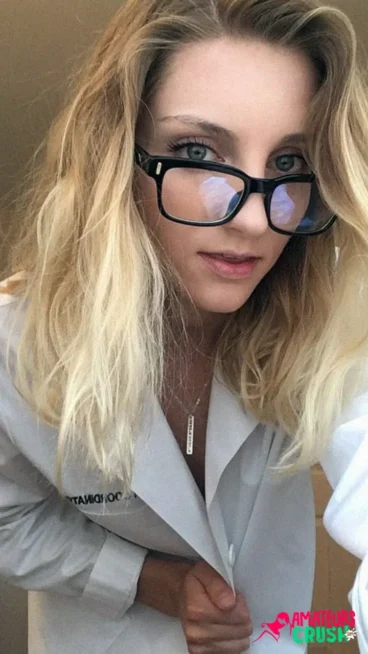 hot nerdy lab assistant M. in her lab coat big glasses selfie