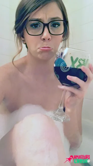 Jess sipping wine while taking a bath soapy teaser
